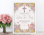 an A2 elegant pastel ladies tea party welcome sign in a white frame leaning up against a white wall next to some pink flowers in a vase