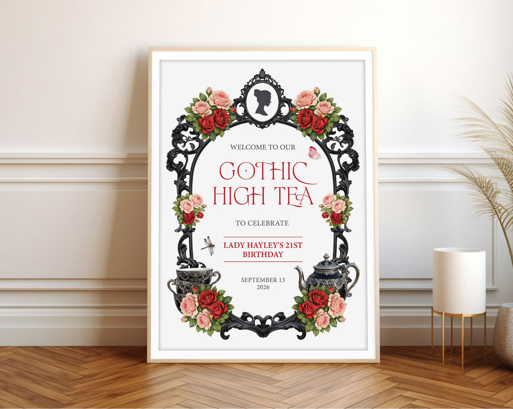 gothic high tea sign with ornate black frame and regency cameo, in a white frame leaning up against a white panelled wall with some dried flowers next to it