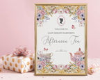 pretty pastel welcome sign for an afternoon tea event with bridgerton-inspired cameo, teapot and teacup illustration in a gold frame leaning up against a pink background next to a wrapped gift