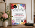 an A3 fundraising poster with QR code for a Church Rainbow Tea, in a wooden frame leaning up against a wall next to some flowers in a vase and a religious sign on the wall