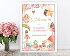 fairy garden tea party sign in a white frame leaning up against a white wall next to a vase of pink flowers