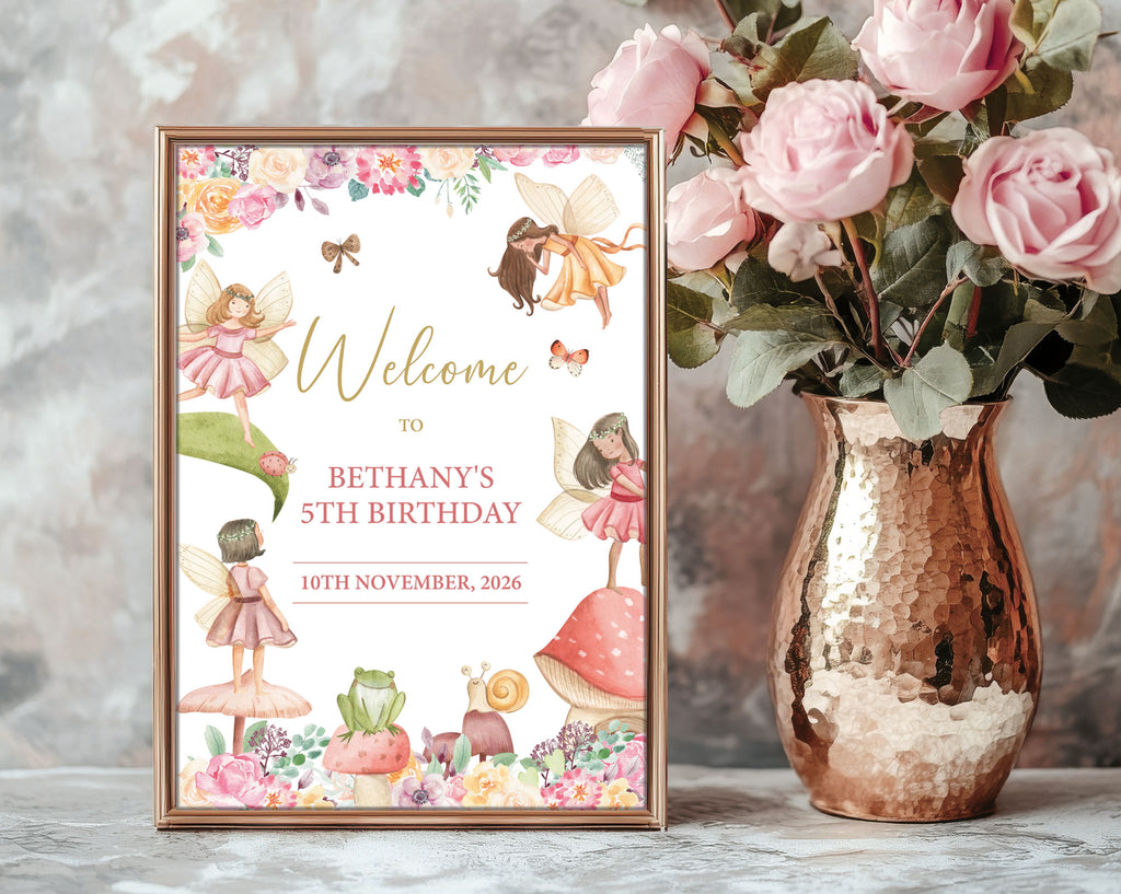 fairy garden tea party A3 welcome sign in a wooden frame, leaning up agains a grey patterned wall next to some pink flowers in a brass colored vase