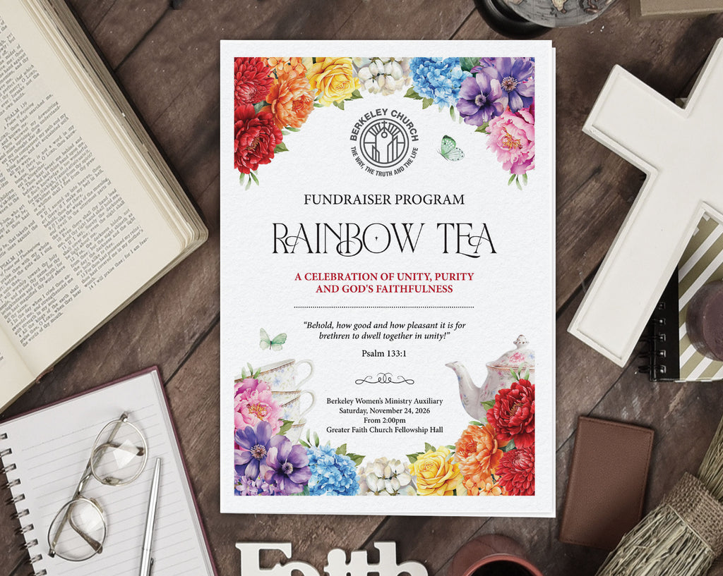 A printed 4 page A4 folded fundraiser program for a Rainbow Tea Church event is displayed in a styled flat-lay on a dark wooden table surrounded by an open Bible, glasses, a notebook, a cross, and other decorative items.