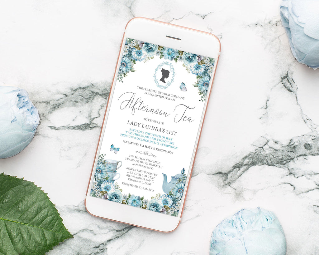 Phone displaying an afternoon tea invitation on a marble gold rimmed mobile with a dusty blue afternoon tea invitation displaying on it surface with decorative flowers and a leaf.
