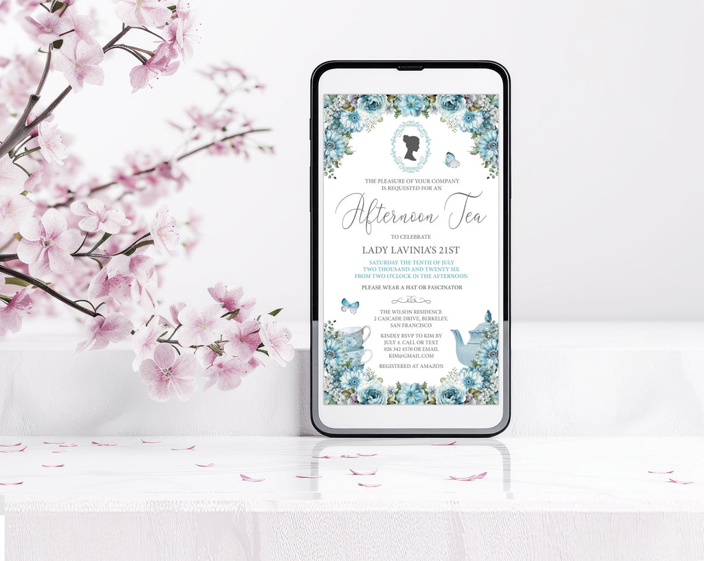 Phone displaying blue flower invitation for a afternoon tea party with a bridgerton inspired cameo an afternoon tea invitation with cherry blossoms in the background