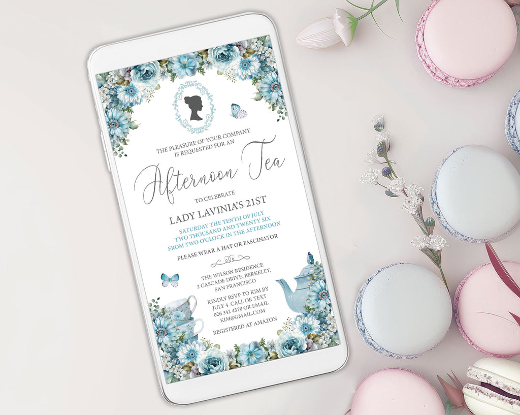 Phone displaying an afternoon tea invitation with floral design on a table with macarons.