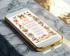 A gold-framed smartphone lying diagonally on a white and gray marble surface, displaying an autumn-themed invitation design with pumpkins, leaves, bird, pies and mushrooms.