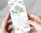 A person holds a smartphone showing a printed invitation design for a 'Blue Princess Party' with a watercolor-style castle, horse-drawn carriage, and floral border. The phone is rose gold, and the hands are visible against a soft light gray fabric background.