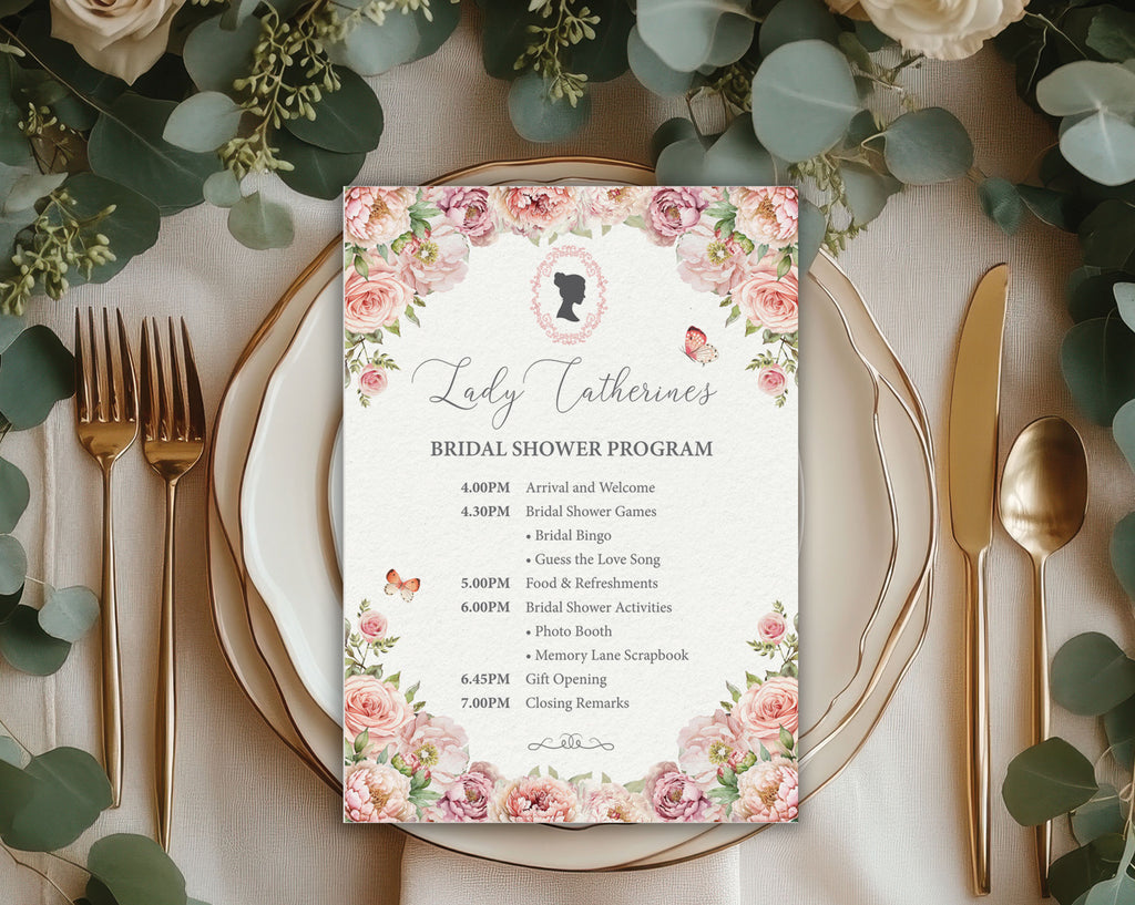 Blush Pink Bridal shower itinerary card on a decorative table setting with flowers and cutlery