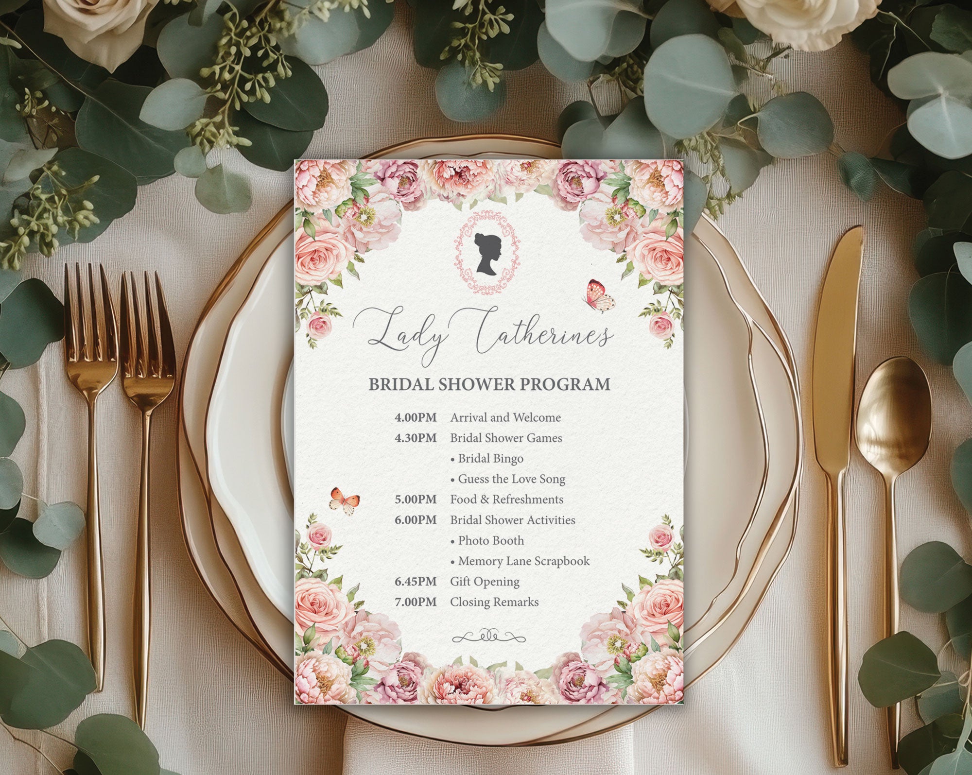 Blush Pink Bridal shower itinerary card on a decorative table setting with flowers and cutlery