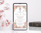blush pink flower church event afternoon tea invitation with cross, teapot and butterflies leaning up agains a white wall next to pink blossoms and bible