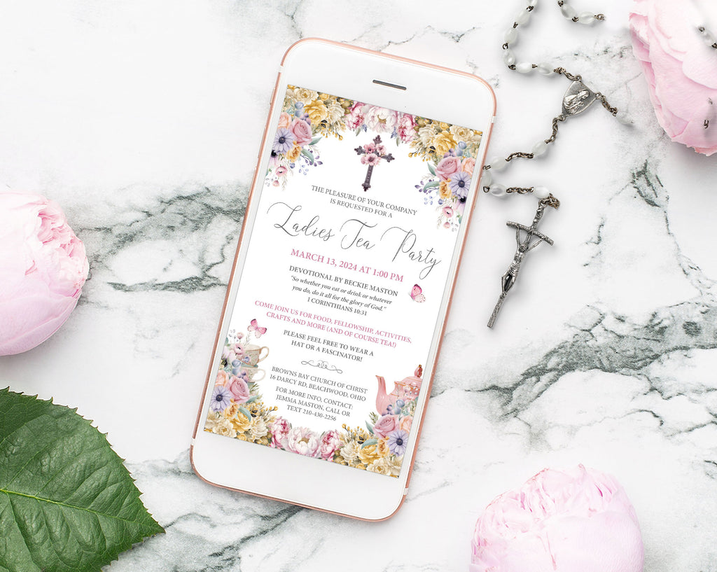 church event church ladies tea invitation showing on a white mobile phone laying on a marble background next to a rosary and pink flowers