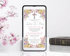 pastel flower church event afternoon tea invitation with cross, teapot and butterflies leaning up agains a white wall next to pink blossoms and bible
