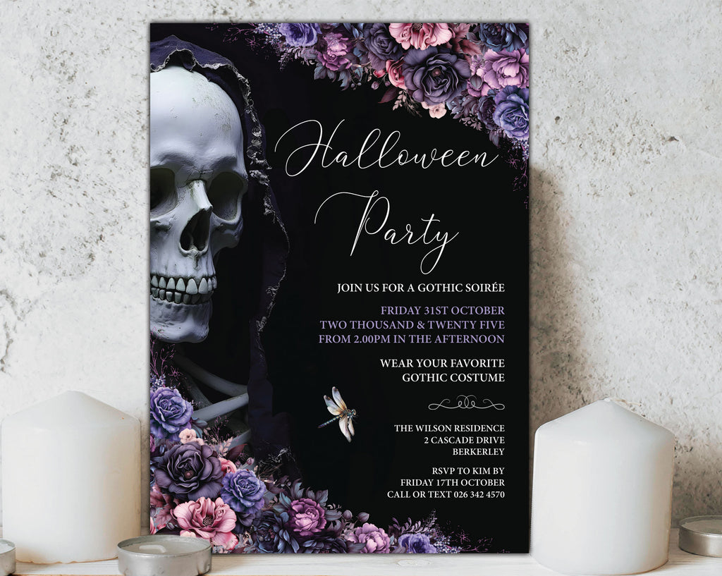 A gothic Halloween party invitation card featuring a large white skull, purple and pink roses, and elegant white script text on a black background, styled on a textured light gray surface with white candles.