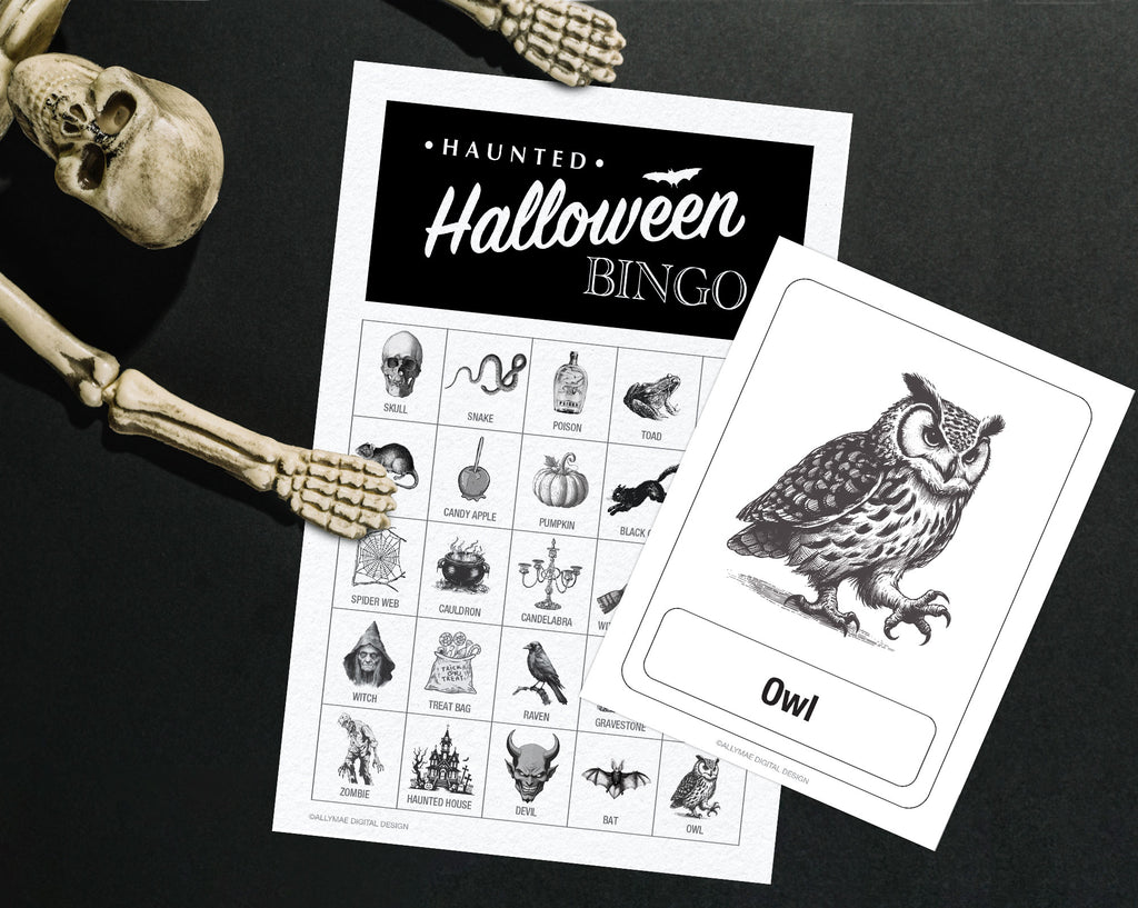 A Halloween bingo game setup on a dark surface, featuring a printed bingo sheet with spooky icons and a separate card showing an owl illustration. A skeleton prop is placed around the items, and the sheet includes the text 'Haunted Halloween Bingo.