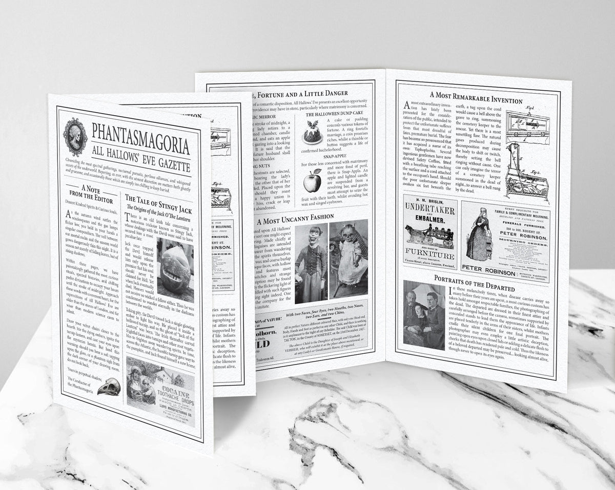 A vintage-style printed 4 page Halloween brochure displayed on a white marble surface against a light gray background. The pages are mostly white with black text and small vintage illustrations, including a prominent headline reading 'Phantasmagoria All Hallows Eve Gazette.