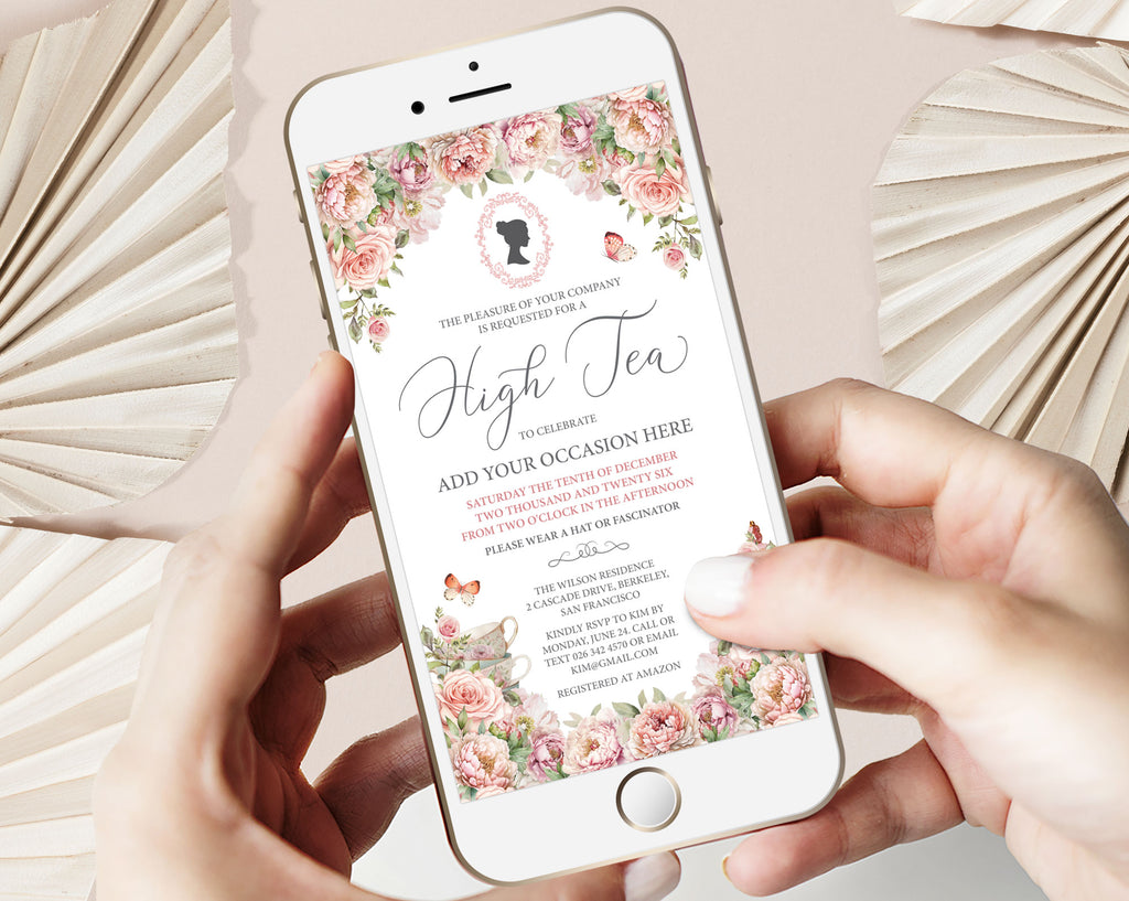 Regency High Tea Invitation with Cameo, Blush Pink Flowers and Teapot, showing on mobile phone held by two hands with a beige background