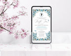 Phone displaying blue flower invitation for a high tea party with a bridgerton inspired cameo an afternoon tea invitation with cherry blossoms in the background