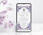 A smartphone mockup displaying a purple floral 'High Tea' invitatio with cameo, set against a white background with soft pink cherry blossom branches on the left.