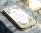 Gold phone case with thank you note in pastel flower design on a marble surface