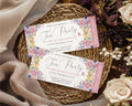 Pastel Flower Tea party invitation with floral design and butterflies on a woven mat with flowers.