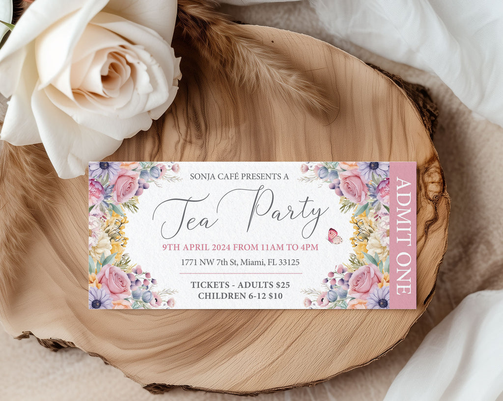 Elegant Tea party admit one ticket with floral design on a wooden surface with white roses.