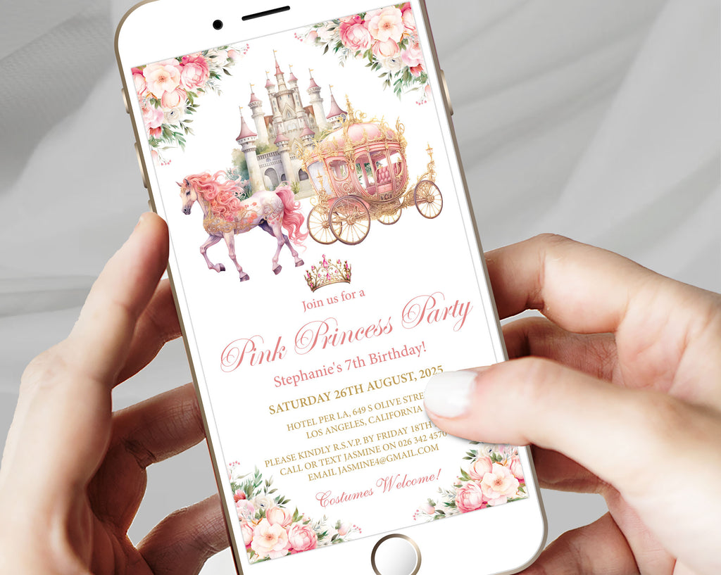 A close-up of a person holding a smartphone that displays a pink princess party invitation with an illustration of a castle, carriage, and floral border.