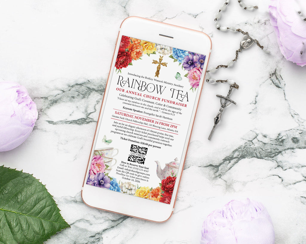 A smartphone lying on a white marble surface, displaying a colorful church fundraiser invitation titled 'Rainbow Tea.' The phone is surrounded by purple flowers, a green leaf, and a silver cross.