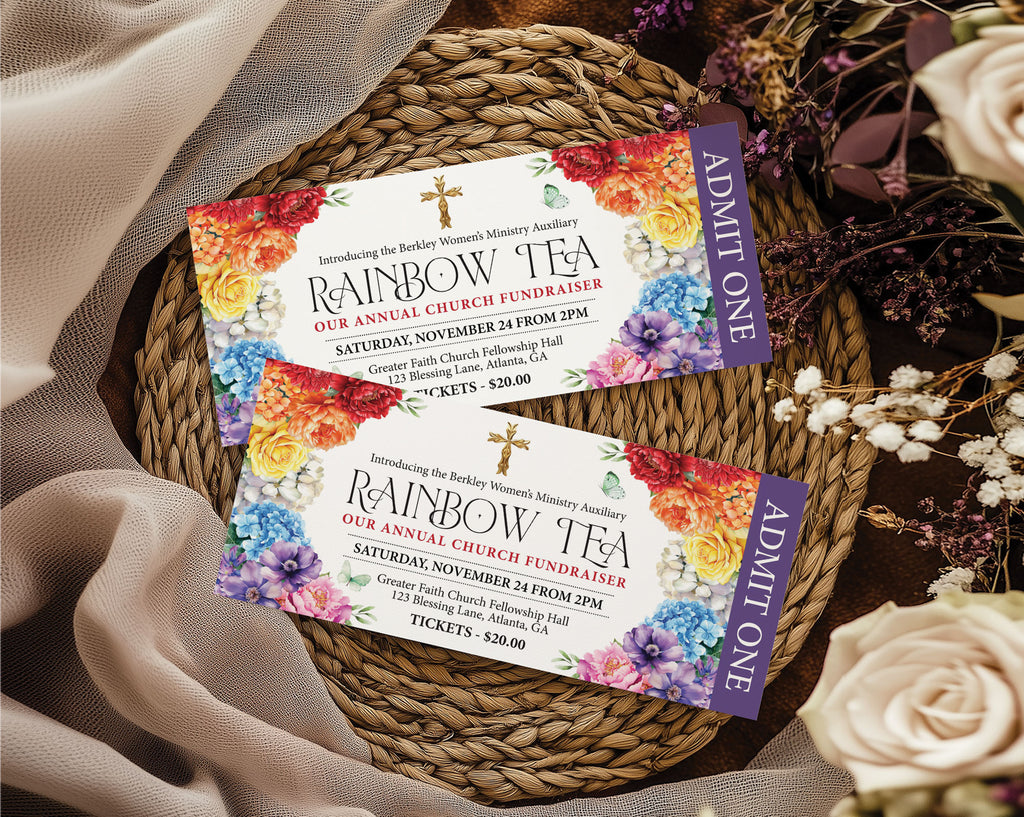 2 rainbow tea church event admit one tickets on a rattan mat with pretty flowers and a beige cloth