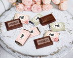 regency style Hershey's chocolate bars on a decorative plate with pink roses.