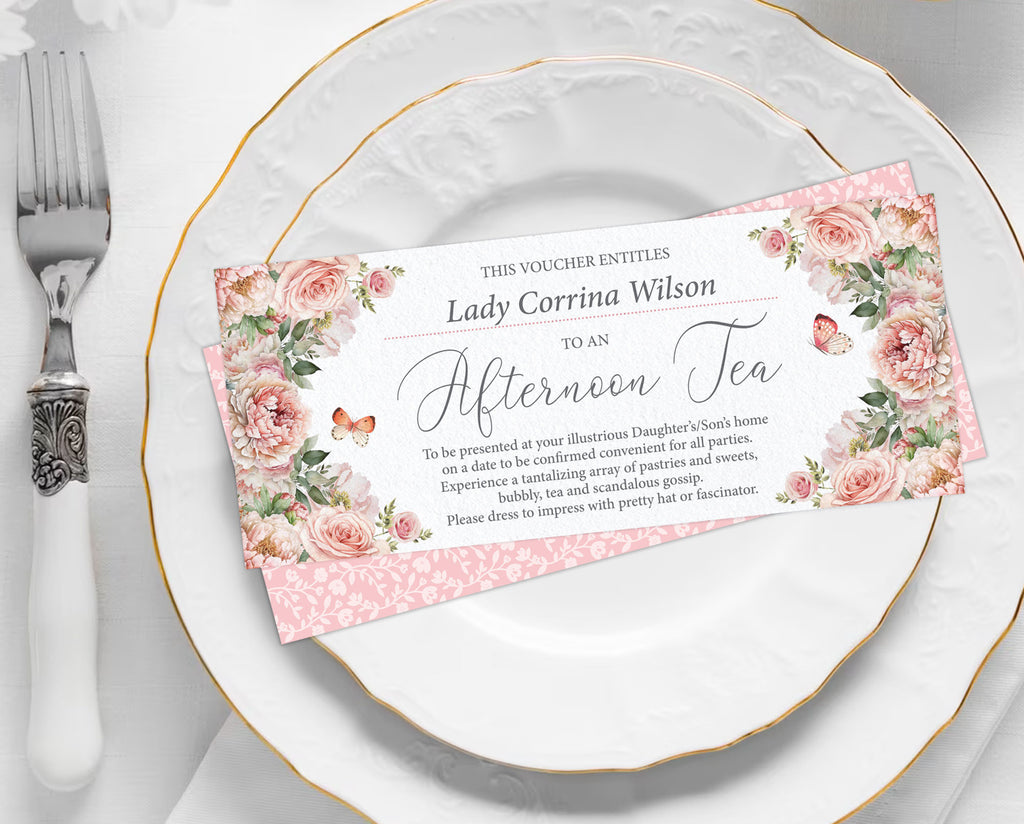 pretty blush pink Floral voucher on a white plate with silverware