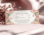 elegant blush pink flower voucher that offers a home made afternoon tea leaning up against some dried flowers and a silk pink background