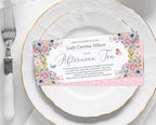 front and back of a pastel Floral voucher on a white plate with silverware